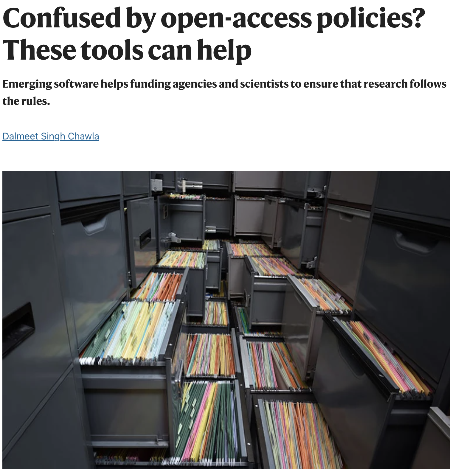 A screenshot Nature’s website shows the title "Confused by open-access policies? These tools can help" alongside a decorative image of a room full of open filing cases.